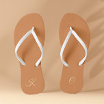 Terracotta Modern Elegant Minimal Simple Monogram Jandals<br><div class="desc">These trendy and stylish Terracotta Modern Elegant Minimal Simple Monogram Flip Flops offer a minimalistic design that blends seamlessly with the contemporary aesthetic. The terracotta colour palette adds an elegant touch to your footwear, while the personalised monogram brings a unique and personal aspect to your look. These flip flops make...</div>