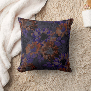 Terracotta, purple flowers on a velvety grey  cushion