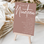 Terracotta Scripted Table NINETEEN Guest Names Table Number<br><div class="desc">Simple and chic table number cards in Terracotta and white make an elegant statement at your wedding or event. Design features "table [number]" in an eyecatching mix of classic serif and handwritten script lettering, with individual guest names beneath. Design repeats on both sides. Individually numbered cards sold separately; order each...</div>