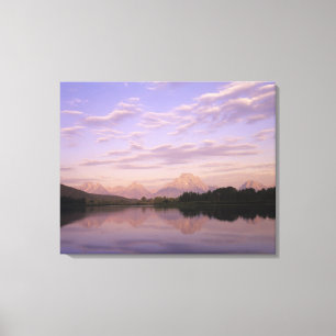 Teton Range reflected on the Snake River. Grand Te Canvas Print