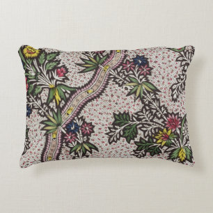 Textile design of plant forms and serpentine ribbo decorative cushion