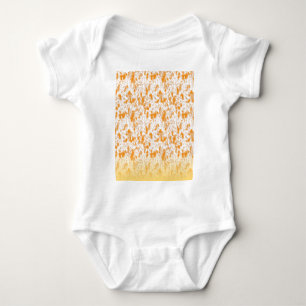 Textile pattern featuring a vibrant orange and gol baby bodysuit