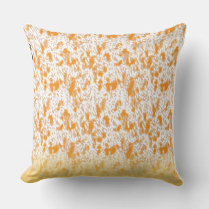 Textile pattern featuring a vibrant orange and gol cushion