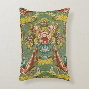 Textile with a repeating floral motif decorative cushion