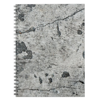 Texture of an old cracked concrete wall. Backgroun Notebook