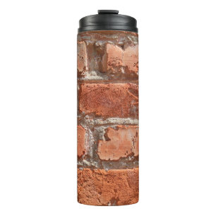 Texture of old weathered brick. Background of old Thermal Tumbler