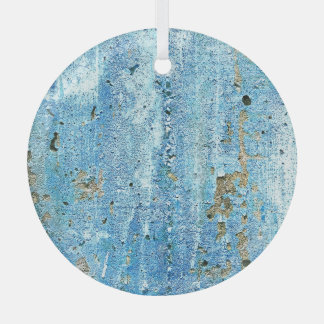 Textured concrete wall, rust stains. glass tree decoration
