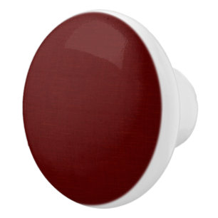 Textured dark red, red-brown.   ceramic knob
