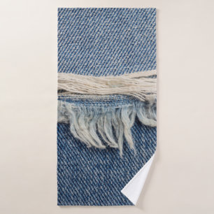 Textures ripped jeans background. bath towel