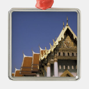 Thailand, Bangkok. Morning sun reflects off the Metal Tree Decoration