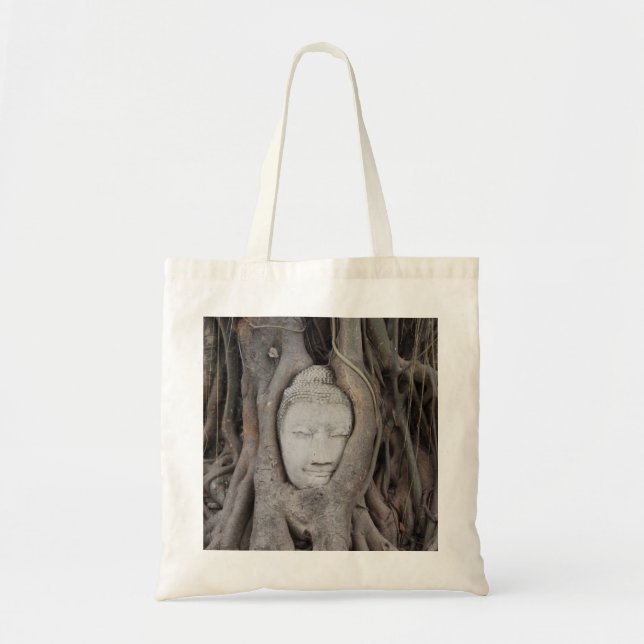 Thailand Head of Buddha surrounded by trees Tote Bag (Front)