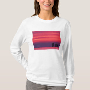 Thailand, Phang Nga Bay. Pink sky reflected in T-Shirt