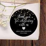 THANK YOU for Celebrating BLACK Gold Wedding Classic Round Sticker<br><div class="desc">Lovely  personalized wedding stickers/labels for your gift favors. Little faux diamond heart to add a little sparkle and touch of class. Gold confetti. Wording: Thank you for celebrating with us. These thank you wedding sticker templates can be edited as you like.</div>