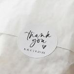 Thank You Stickers for Wedding Favours Modern Hear<br><div class="desc">These Modern Thank You Wedding Favour Stickers are designed in a stylish round shape, featuring elegant modern handwriting with a small heart. Personalised with the couple's initials and wedding date, they add a chic and thoughtful touch to any wedding favour. Perfect for a sleek, modern look that makes your thank-you...</div>