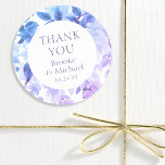 Thank You Watercolor Wisteria Floral Wedding Classic Round Sticker<br><div class="desc">Thank You Purple Watercolor Wisteria Floral Wedding Stickers features elegant watercolor wisteria flowers in soft lavender and purple with green leaves on a white background with "Thank You" in modern purple calligraphy script with your names and wedding date below. Designed for you by Evco Studio www.zazzle.com/store/evcostudio</div>