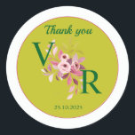 Thank you wedding sticker<br><div class="desc">Elegant wedding thank-you sticker featuring the phrase "Thank You, " the initials of the bride and groom with a floral element in between, and the wedding date. Perfect for sealing gift boxes, party favours, or thank-you cards. This romantic and classy design adds a personalised touch to your special day. Fully...</div>