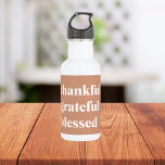 Thankful Grateful Blessed Fall Neutral  532 Ml Water Bottle<br><div class="desc">Stay hydrated while celebrating the season of gratitude with our “Thankful,  Grateful,  Blessed” water bottle. Designed in warm neutral fall tones with bold modern typography,  it’s perfect for autumn outings,  Thanksgiving gatherings,  or as a thoughtful seasonal gift. Durable,  reusable,  and available in multiple sizes.</div>