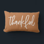 Thankful Thanksgiving Season Autumn Orange Lumbar Cushion<br><div class="desc">Add a cosy touch of gratitude to your home with this "Thankful" Modern Handlettering Autumn Orange Lumbar Accent Pillow. Featuring elegant white hand-lettered text on a warm autumn orange background, this pillow is perfect for celebrating the Thanksgiving season. Its sleek, modern design adds charm to any space, making it a...</div>