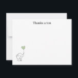 “Thanks a Tonne” Thank You Note Card<br><div class="desc">Send a heartfelt “Thanks a tonne!” with this adorable minimalist thank you card featuring a sweet baby elephant holding a green heart balloon. Perfect for baby showers, kids’ thank-you notes, birthdays, or any occasion that calls for a little extra cuteness. The clean white background and simple design make it suitable...</div>