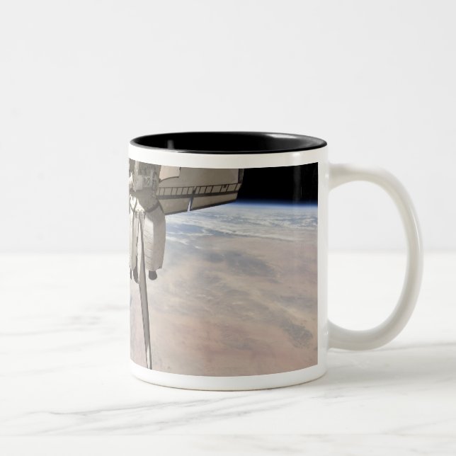 The aft section of the docked space shuttle Two-Tone coffee mug (Right)