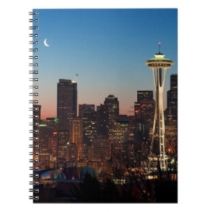 The American flag flies between the rising moon Spiral Notebook