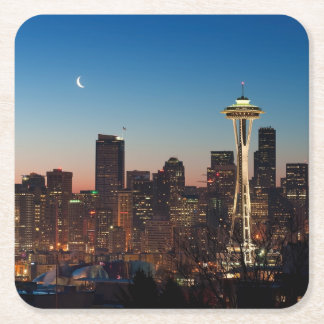 The American flag flies between the rising moon Square Paper Coaster