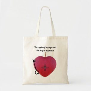 The apple of my eye and the key to my heart tote bag