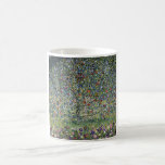 The Apple Tree (by Gustav Klimt) Coffee Mug<br><div class="desc">This design features artwork by Gustav Klimt (1862–1918), who was an Austrian symbolist painter and one of the most prominent members of the Vienna Secession movement. The painting featured in this design shows a beautiful apple tree bearing fruit, bright red apples hanging from its boughs. The image is painted with...</div>