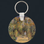 The Artist's Garden at Vetheuil by Claude Monet Key Ring<br><div class="desc">The Artist's Garden at Vetheuil (1880) by Claude Monet is a vintage impressionism fine art floral nature painting. A young girl is flanked by tall blooming yellow sunflower flowers during the summer season. A child is standing in a path in Monet's garden in Vetheuil (a suburb of Paris). About the...</div>