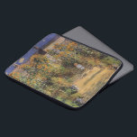 The Artist's Garden at Vetheuil by Claude Monet Laptop Sleeve<br><div class="desc">The Artist's Garden at Vetheuil (1880) by Claude Monet is a vintage impressionism fine art floral nature painting. A young girl is flanked by tall blooming yellow sunflower flowers during the summer season. A child is standing in a path in Monet's garden in Vetheuil (a suburb of Paris). About the...</div>