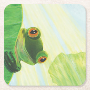 The big-eyed green frog behind lily pad square paper coaster