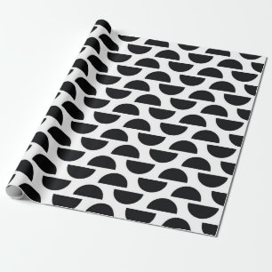 The black halves of the circle create a simple pat wrapping paper