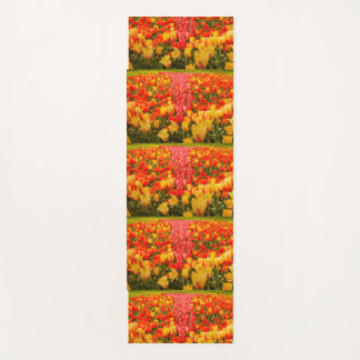 the blossoming of tulips in a park on yoga mat
