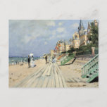 The Boardwalk at Trouville by Claude Monet Postcard<br><div class="desc">The Boardwalk at Trouville (1870) by Claude Monet is a vintage impressionist fine art painting featuring a beach at a seaside resort in Normandy, France on a beautiful sunny day. About the artist: Claude Monet (1840-1926) was a founder of the French impressionist painting movement with most of his paintings being...</div>