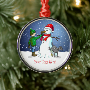 The boy makes a wonderful snowman metal tree decoration
