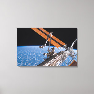 The Canadarm2 and solar array panel wings Canvas Print
