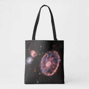 The Cartwheel Galaxy And Its Companion Galaxies. Tote Bag