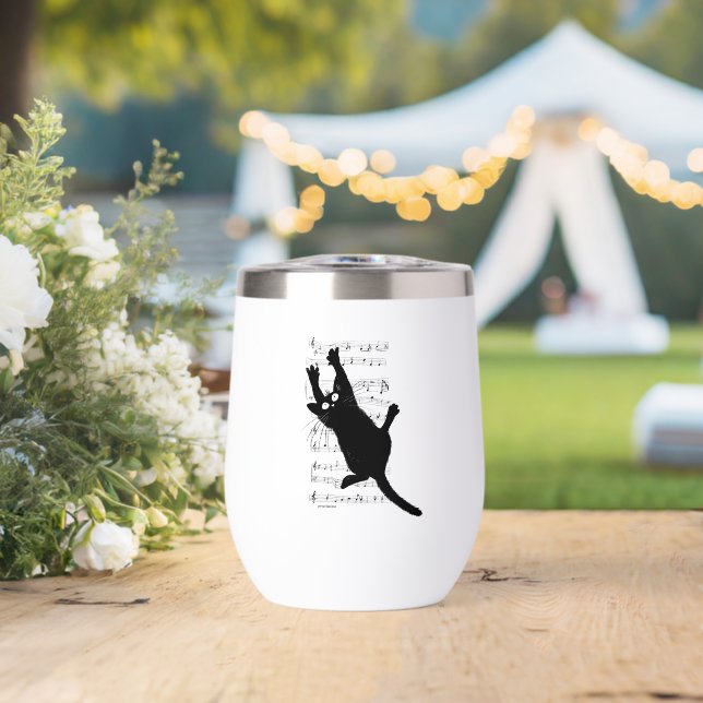 The cat hangs on musical notes (Wedding (Rotated))