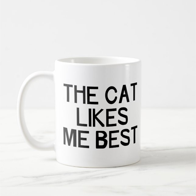The Cat Likes Me Coffee Mug (Left)