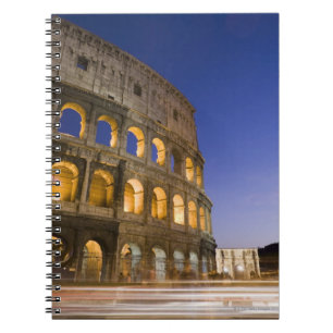 the Colosseum ampitheatre illuminated at night Spiral Notebook