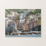 The Colour of the Italian Riviera Cinque Terra Jigsaw Puzzle<br><div class="desc">Cinque Terra in the Italian Riveria -- As a tourist centre, the Italian Riviera benefits from over 300 days of sunshine per year, and is known for its beaches, colourfully painted towns, natural environment, food, rock climbing and scenic views of centuries old farmhouses and cottages. This jigsaw puzzle design was...</div>