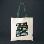 The Coolest People on Earth Live in San Marino Tote Bag<br><div class="desc">This design features bold, layered text with the phrase "The Coolest People on Earth Live in San Marino" in a striking cool color palette. A globe graphic, integrated with coordinating blue and green blocks, symbolizes the city's global appeal. The design is suitable for showcasing local pride, as it boldly declares...</div>