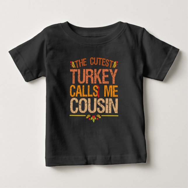 The Cutest Turkey Calls me Cousin Thanksgiving Baby T-Shirt (Front)