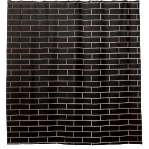 The dark black brick wall has a rough surface as a shower curtain