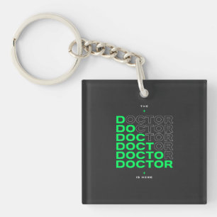 The Doctor Is Here Neon Text Design Key Ring