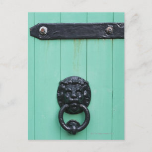 The door knocker of the Gardner Postcard