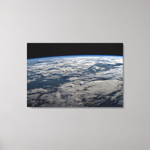 The Earth's Limb Above A Cloudy Western Australia. Canvas Print