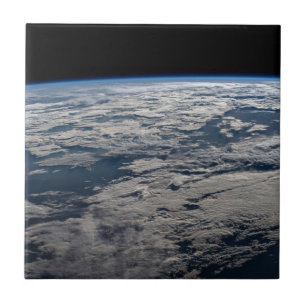 The Earth's Limb Above A Cloudy Western Australia. Tile
