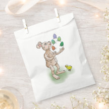 The Easter Bunny juggles with the Easter eggs