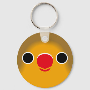 The face of a fischer's lovebird key ring